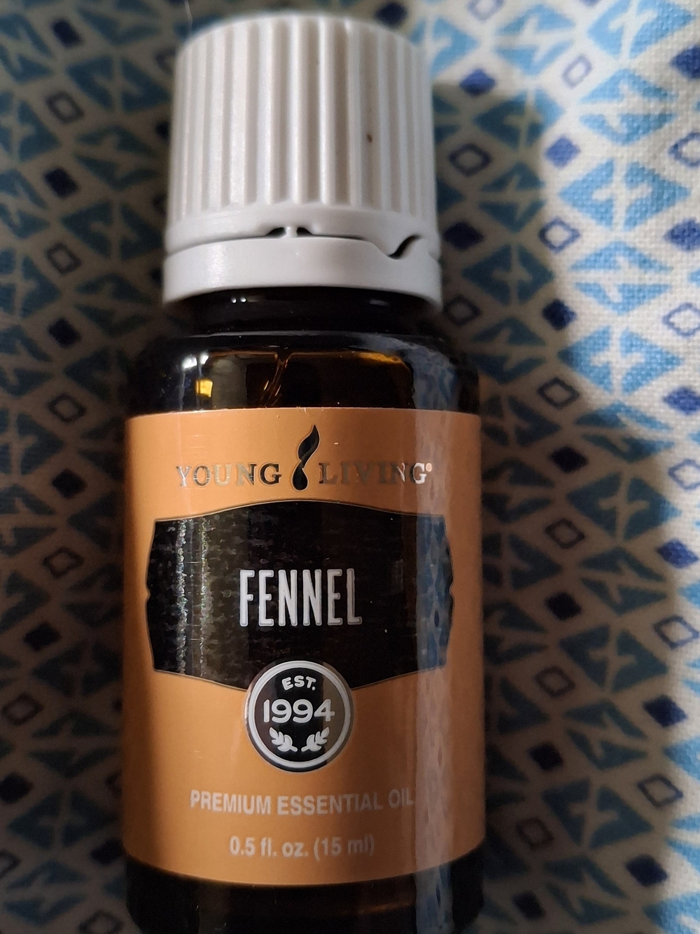 Young Living Fennel Essential Oil — Orange, Black, White
